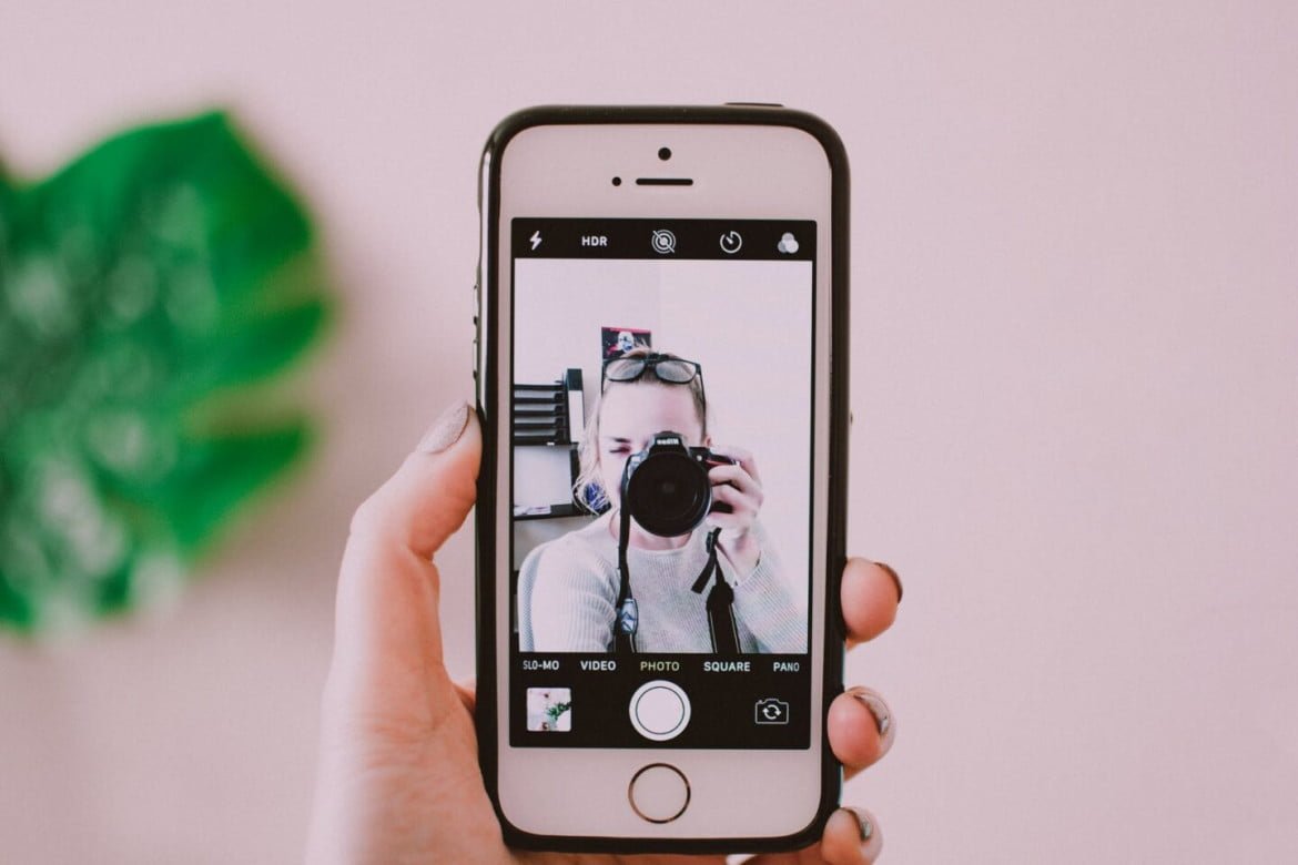person holding iphone