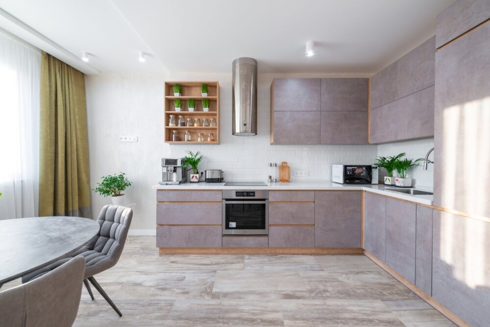 interior of stylish kitchen in modern apartment